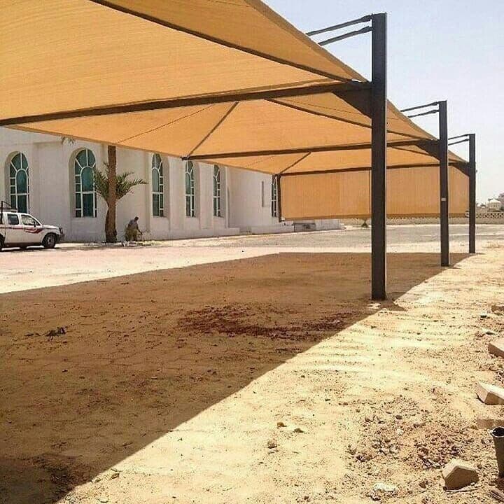 تركيب مضلات وسواتر حديد وخشب للمنازل والمواقف